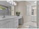 Bathroom with dual sinks and white cabinets, offering lots of vanity space at 2190 Keith Hills Rd, Lillington, NC 27546