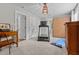 Bonus room featuring a Murphy bed, treadmill, and desk with natural light at 2190 Keith Hills Rd, Lillington, NC 27546
