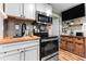 Well-equipped kitchen featuring stainless steel appliances, a wooden countertop, and ample storage at 2190 Keith Hills Rd, Lillington, NC 27546