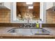 Kitchen sink with a window overlooking a wood ceiling Gathering room with skylights at 2190 Keith Hills Rd, Lillington, NC 27546