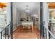 View of kitchen featuring a breakfast bar, stainless appliances and hardwood flooring at 2190 Keith Hills Rd, Lillington, NC 27546