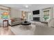 Comfortable living room featuring a brick fireplace and stylish decor at 2190 Keith Hills Rd, Lillington, NC 27546