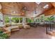 Sunroom with brick floors, multiple windows, skylights, and wood ceiling at 2190 Keith Hills Rd, Lillington, NC 27546