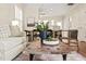 Open living room features hardwood floors and a cozy aesthetic perfect for relaxing at 240 Standish Dr, Chapel Hill, NC 27517
