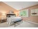 Serene bedroom with a plush bed, soft lighting, and a calming color scheme at 240 Standish Dr, Chapel Hill, NC 27517