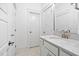 Bright bathroom with marble countertop vanity and neutral ceramic tile floor at 2521 Georgianna Dr, Wake Forest, NC 27587