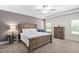 Primary bedroom with decorative wall color, ceiling fan, side tables and dressers at 2521 Georgianna Dr, Wake Forest, NC 27587