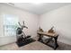 Carpeted spare bedroom featuring workout machine and office desk at 2521 Georgianna Dr, Wake Forest, NC 27587