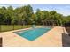 Backyard swimming pool with beautiful concrete patio, pergola, and privacy fencing at 2521 Georgianna Dr, Wake Forest, NC 27587