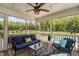 Comfortable screened porch with ample seating and serene views of the pool and backyard at 2521 Georgianna Dr, Wake Forest, NC 27587