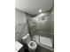 Bathroom featuring a framed shower door, towel rack and gray wall at 3030 Forrester St, Durham, NC 27704