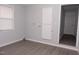 Laundry room area has hookups and grey wood-look floors at 3030 Forrester St, Durham, NC 27704