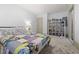 Inviting bedroom with carpeted floors, and bright natural light from the sunlit window at 304 Linden Ave, Raleigh, NC 27601