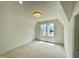 Bedroom features a window providing great outdoor views and natural light plus neutral walls and trim at 323 Hudson St, Raleigh, NC 27608