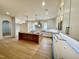 Spacious kitchen with large island, custom cabinetry, and stainless steel appliances at 323 Hudson St, Raleigh, NC 27608