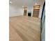 Bright living room with hardwood floors, built-in shelves, and a fireplace at 323 Hudson St, Raleigh, NC 27608