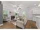 Inviting living room with a fireplace, hardwood floors, and plenty of natural light at 359 Ashton Ridge Ln, Cary, NC 27513