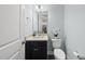Clean powder room with vanity and sleek fixtures at 359 Ashton Ridge Ln, Cary, NC 27513