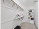 Functional walk-in closet providing ample storage and organization with shelves and clothing rods at 359 Ashton Ridge Ln, Cary, NC 27513