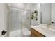 Modern bathroom with a glass-enclosed shower, neutral color palette, and contemporary fixtures at 361 Murray Grey Ln, Wake Forest, NC 27587