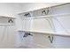 Well-organized walk-in closet with ample hanging space, perfect for wardrobe storage at 361 Murray Grey Ln, Wake Forest, NC 27587
