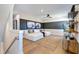 Spacious living room with a comfortable white sectional, stylish decor, and ample natural light at 361 Murray Grey Ln, Wake Forest, NC 27587