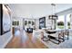 Open-concept living room flows into the dining room, showcasing the elegant design and layout at 361 Murray Grey Ln, Wake Forest, NC 27587