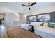 Bright living room with a comfortable sectional, stylish decor, and hardwood floors at 361 Murray Grey Ln, Wake Forest, NC 27587