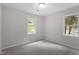 A bright bedroom featuring new carpet and paint, illuminated by natural light at 3700 Summer Pl, Raleigh, NC 27604