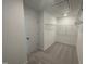 Spacious walk-in closet with ample storage and shelving for optimal organization at 377 Thompson Overlook Way, Smithfield, NC 27577