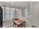 Charming dining area featuring a cozy table setting, natural light, and convenient access to the kitchen at 3806 Bison Hill Ln, Raleigh, NC 27604