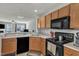 Convenient kitchen with breakfast bar, ample counter space, and modern appliances, perfect for everyday cooking at 3806 Bison Hill Ln, Raleigh, NC 27604
