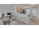 Open-concept living space blending seamlessly with a modern kitchen and offering a comfortable work area at 3806 Bison Hill Ln, Raleigh, NC 27604