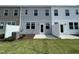 Fenced backyard with small patio at 381 Thompson Overlook Way, Smithfield, NC 27577