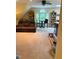Bonus room with carpeting, built-in bookshelves, and a seating area at 404 Versailles Dr, Cary, NC 27511