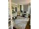 Bright home office with bay window, desk, neutral walls, and decorative accents at 404 Versailles Dr, Cary, NC 27511