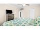 Bright bedroom with light walls, ceiling fan, and carpet floors at 4048 B S Nc 62 Hwy, Burlington, NC 27215