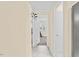 Bright hallway with tile floors and views into multiple rooms at 4048 B S Nc 62 Hwy, Burlington, NC 27215