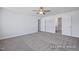 Spacious bedroom with carpet flooring and two doors at 436 Longleaf Glen Lane, Zebulon, NC 27597