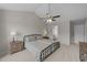 Comfortable bedroom with neutral walls, and a view into the ensuite bathroom at 46 Blaze Ridge Dr, Smithfield, NC 27577