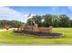 Brick 'Blaze Ridge' community sign features professional landscaping, an American flag, and neighborhood welcome at 46 Blaze Ridge Dr, Smithfield, NC 27577