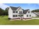 Charming two-story home with a well-manicured lawn and inviting front porch at 46 Blaze Ridge Dr, Smithfield, NC 27577