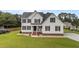 Charming two-story home boasts a well-manicured lawn and classic architectural details, including black shutters at 46 Blaze Ridge Dr, Smithfield, NC 27577
