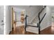 Inviting foyer with hardwood floors and a staircase leading to the upper level at 46 Blaze Ridge Dr, Smithfield, NC 27577