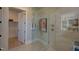 Modern bathroom featuring a glass enclosed shower and walk-in closet at 4628 Rogers Rd, Wake Forest, NC 27587