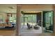 Dining room adjacent to screened porch, seamlessly blending indoor and outdoor living at 4628 Rogers Rd, Wake Forest, NC 27587