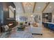 Open living space featuring a fireplace, and integration with the kitchen and dining area at 4628 Rogers Rd, Wake Forest, NC 27587