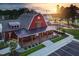 Beautiful clubhouse with rocking chair porch and stunning sunset views at 49 Cozy Hvn, Fuquay Varina, NC 27526