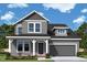 Charming gray two-story home with white trim, two car garage, and well manicured lawn at 49 Cozy Hvn, Fuquay Varina, NC 27526