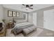 Calm bedroom boasts neutral decor, comfortable furnishings, and natural light from a window at 5002 Kendridge Dr, Durham, NC 27712